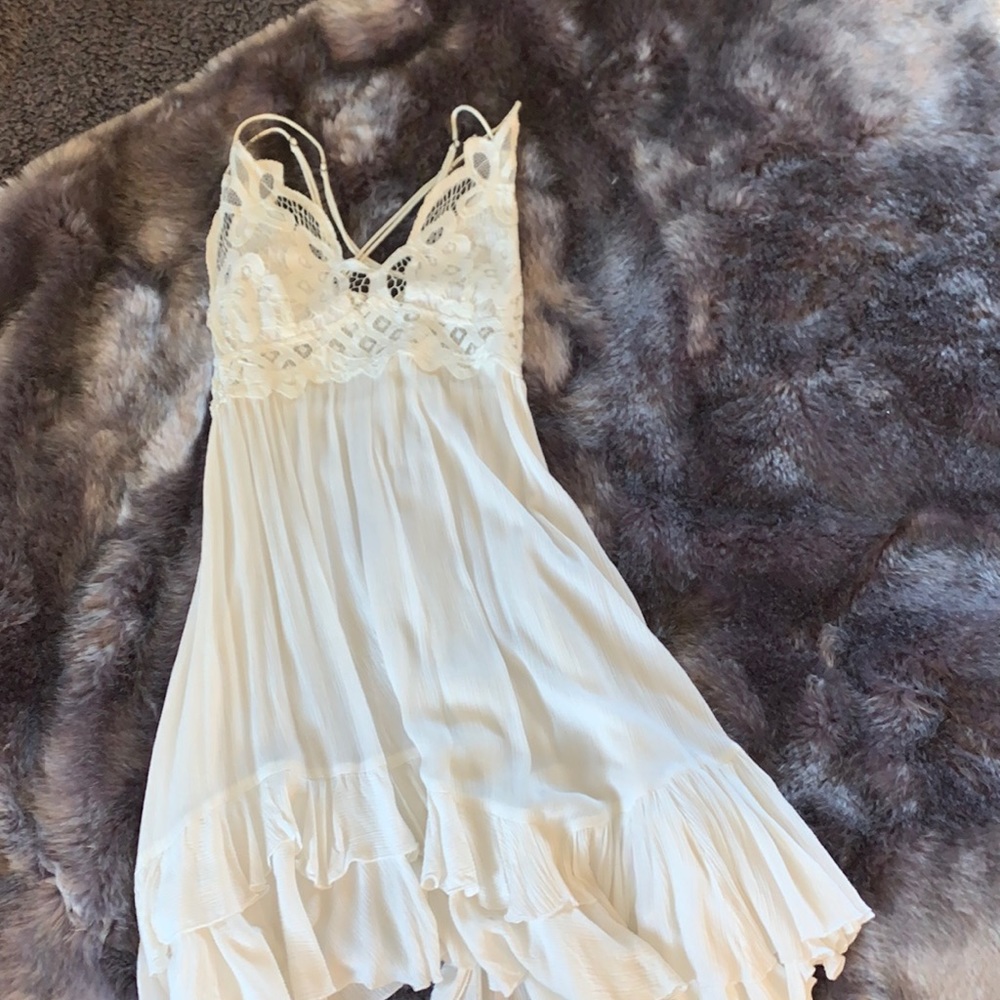 FREE PEOPLE BRAND NEW white dress with cross strings in the back